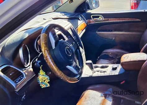 2012 Jeep Grand Cherokee Overland z USA, uszkodzony, nr VIN 1C4RJFCT1CC135388